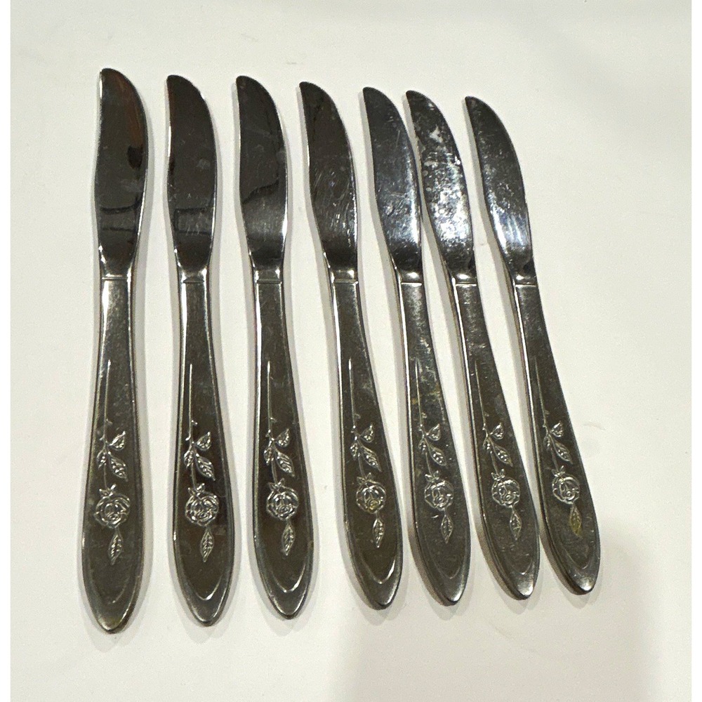 Set of 7 Oneida community stainless dinner knives in the pattern my rose